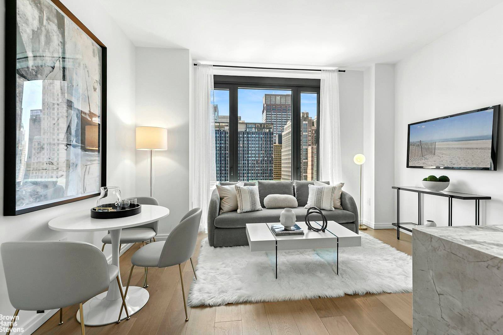 Chic High End Two Bedroom Residence with 5 Star Hotel Amenities Perched on the 40th Floor, this split layout Two Bedroom home designed by renowned architect Thomas Juul Hansen boasts ...