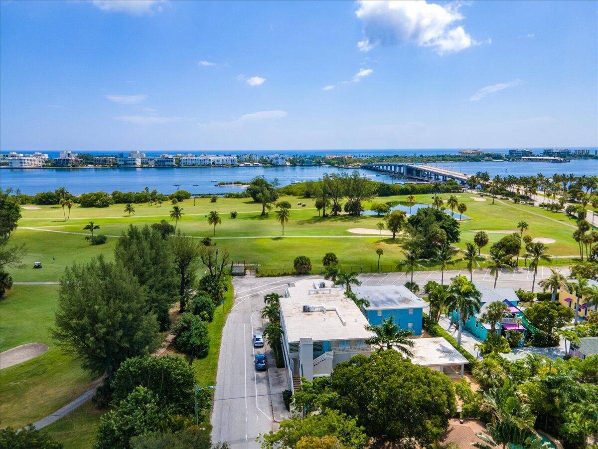 Charming 2 bedroom, 2 bathroom ground floor condo featuring brand new flooring with new HVAC April 2024, a fully renovated kitchen, and updated bathrooms.