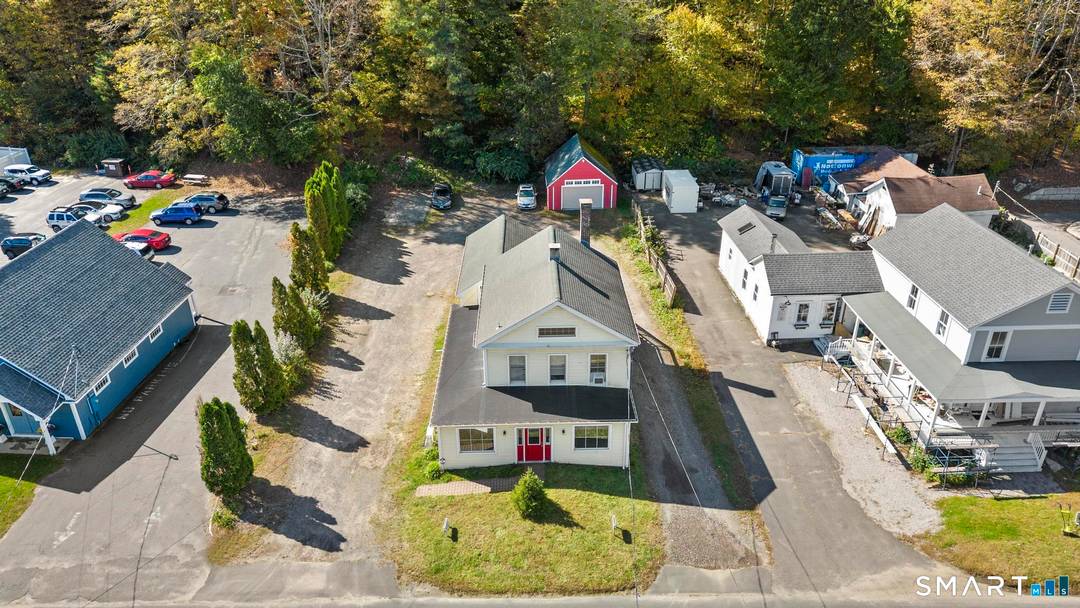 Prime mixed use commercial property located on Main Street with excellent visibility, close to amenities, and ample on site parking.
