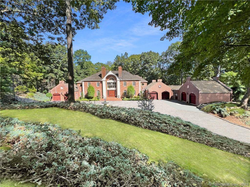Perched high on a scenic knoll off a private road and set on nearly 4 acres of manicured grounds, this timeless estate is a rare opportunity to own one of ...