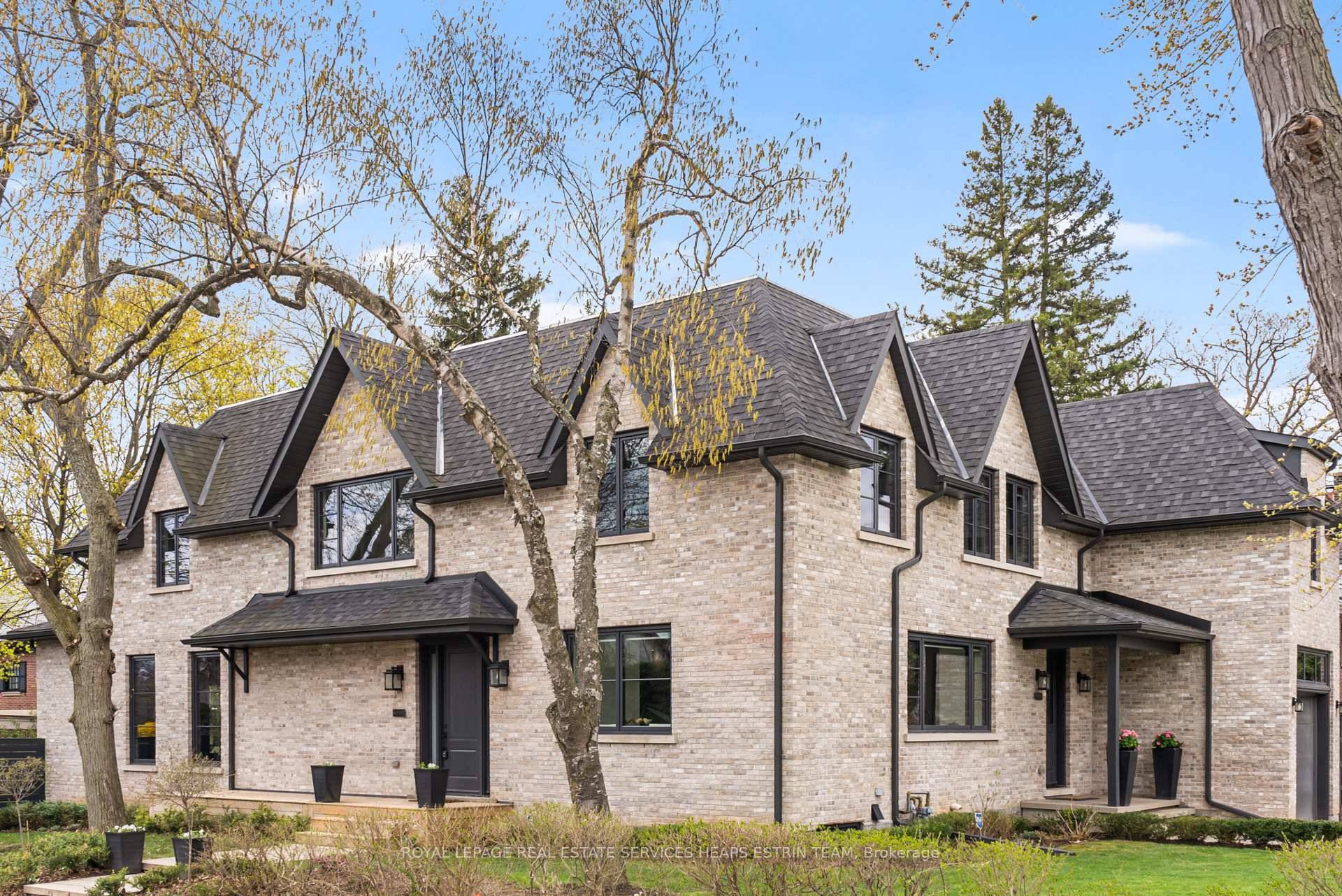Welcome to this exceptional custom built residence in prestigious Bennington Heights, where warm California inspired design meets modern family living.