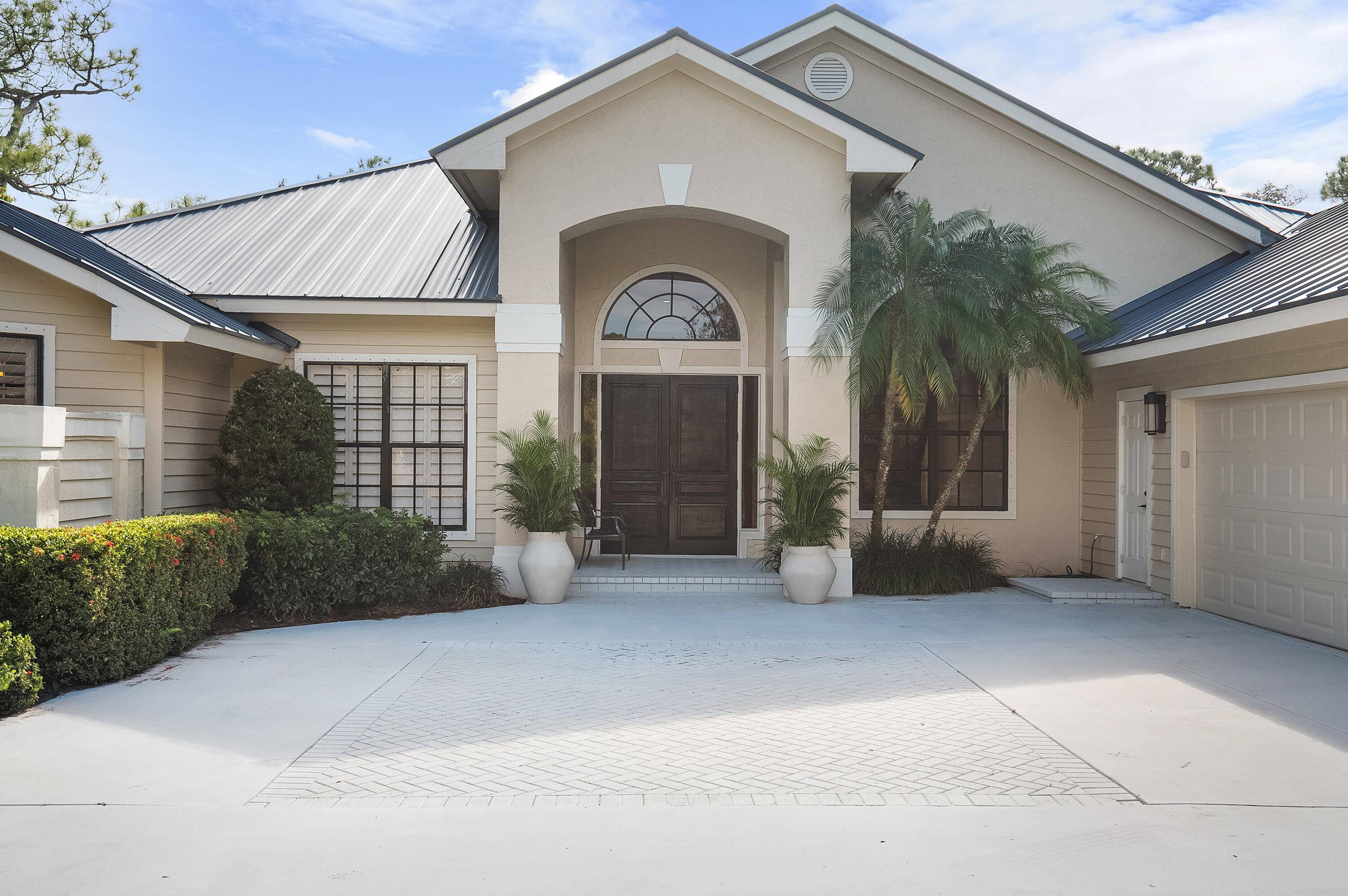 Discover your dream home in the highly sought after Crane Creek neighborhood of Palm City !