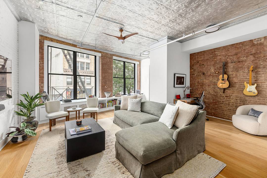 GUT RENOVATED SOHO LOFT complete with original pre war details throughout !