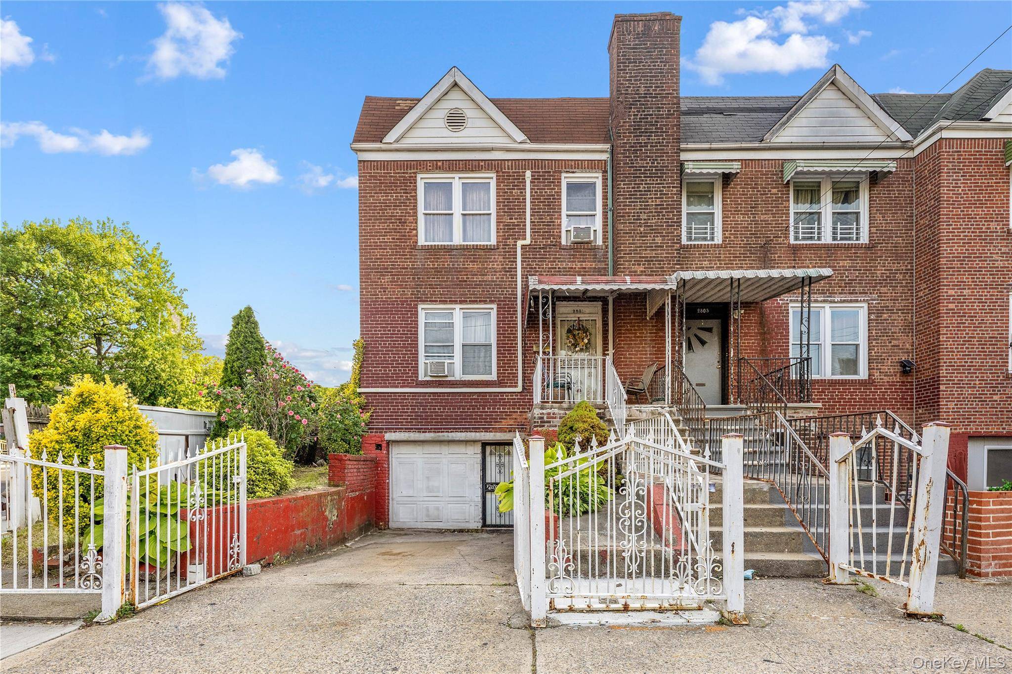 Welcome to this solid brick corner lot 2 family home in the heart of Baychester.