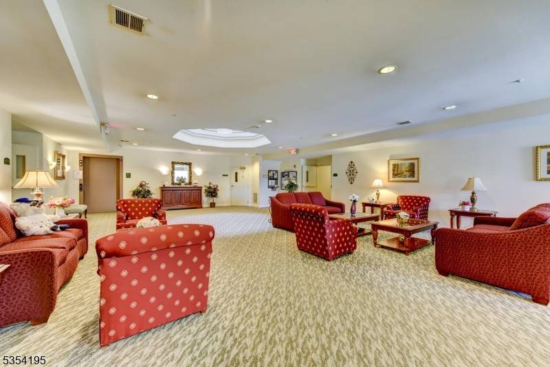 Welcome to Fox Hills, where you can experience resort style living every day in this beautifully maintained Buckingham B model, a spacious 2 bedroom, 2 bath condo designed for easy ...