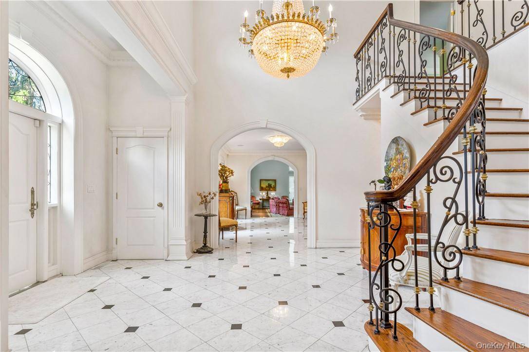Outstanding custom Colonial on a private cul de sac adjoining Old Mill Farm.
