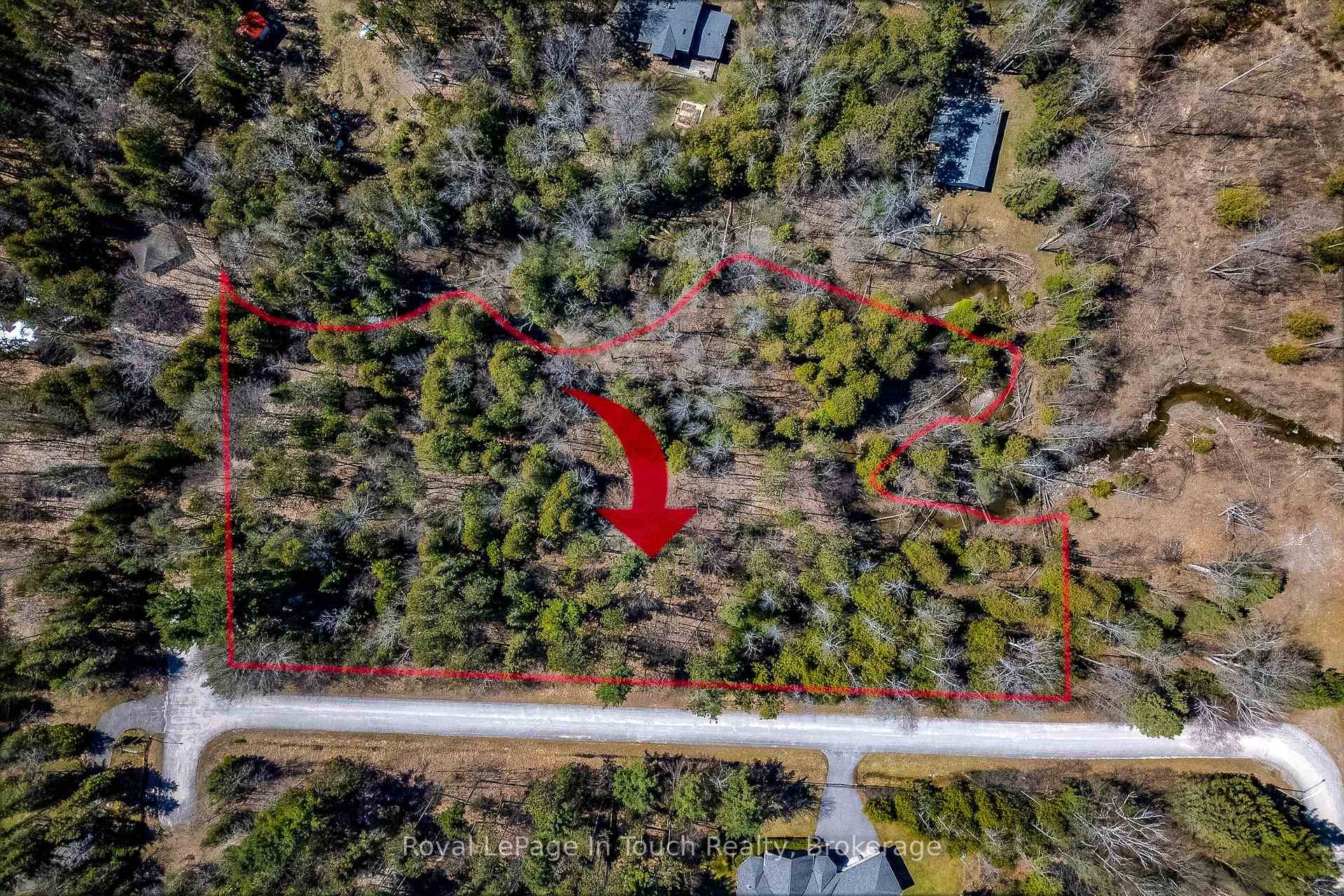 Lot 1 Karola Road on a quiet cul de sac in Tiny Township offers a private retreat in the heart of nature and conveniences.