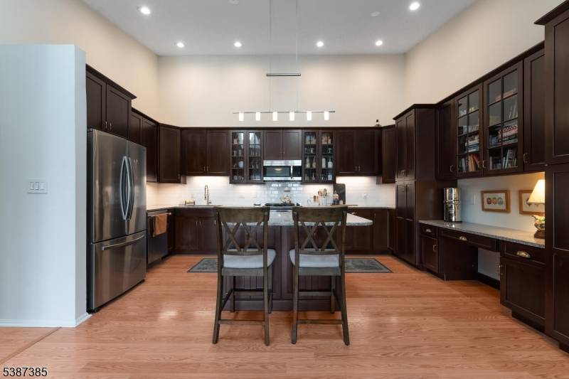 Stunning and luxuriously updated penthouse unit located in the Bradley Gardens section of Bridgewater is move in ready !
