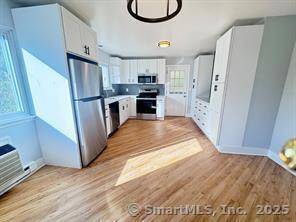 Attention Investors ! Great opportunity to own this beautiful totally remodeled with new kitchens with granite countertops and new bathrooms 3 family home in the Cove area within walking distance ...