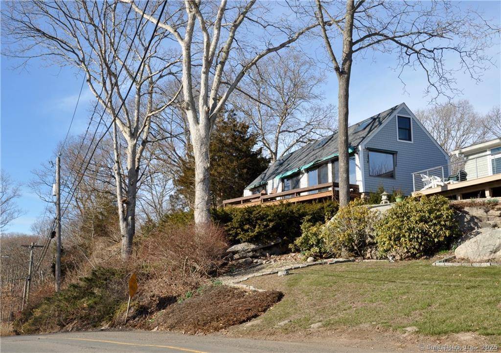 ACADEMIC YEAR 2026 2027 GUILFORD BEACH RENTAL Fully furnished beach home set up above Mulberry Point Road with AMAZING VIEWS OF LONG ISLAND SOUND, just steps from DANIEL AVENUE BEACH.