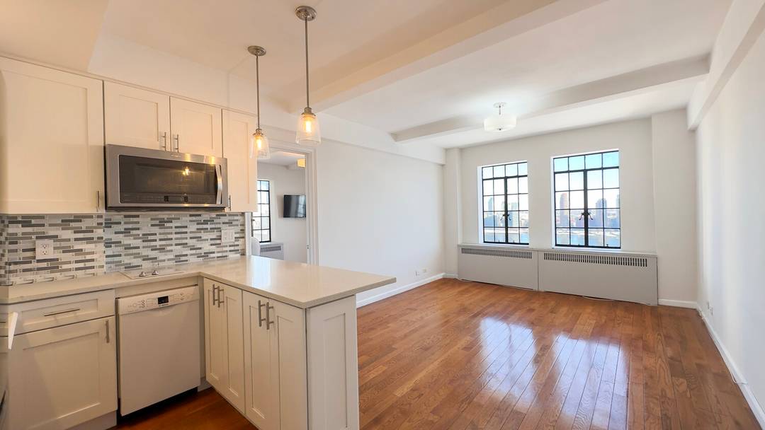 Modern Comfort meets Pre War Charm in this 1 bedroom apartment with stunning views of the East River.