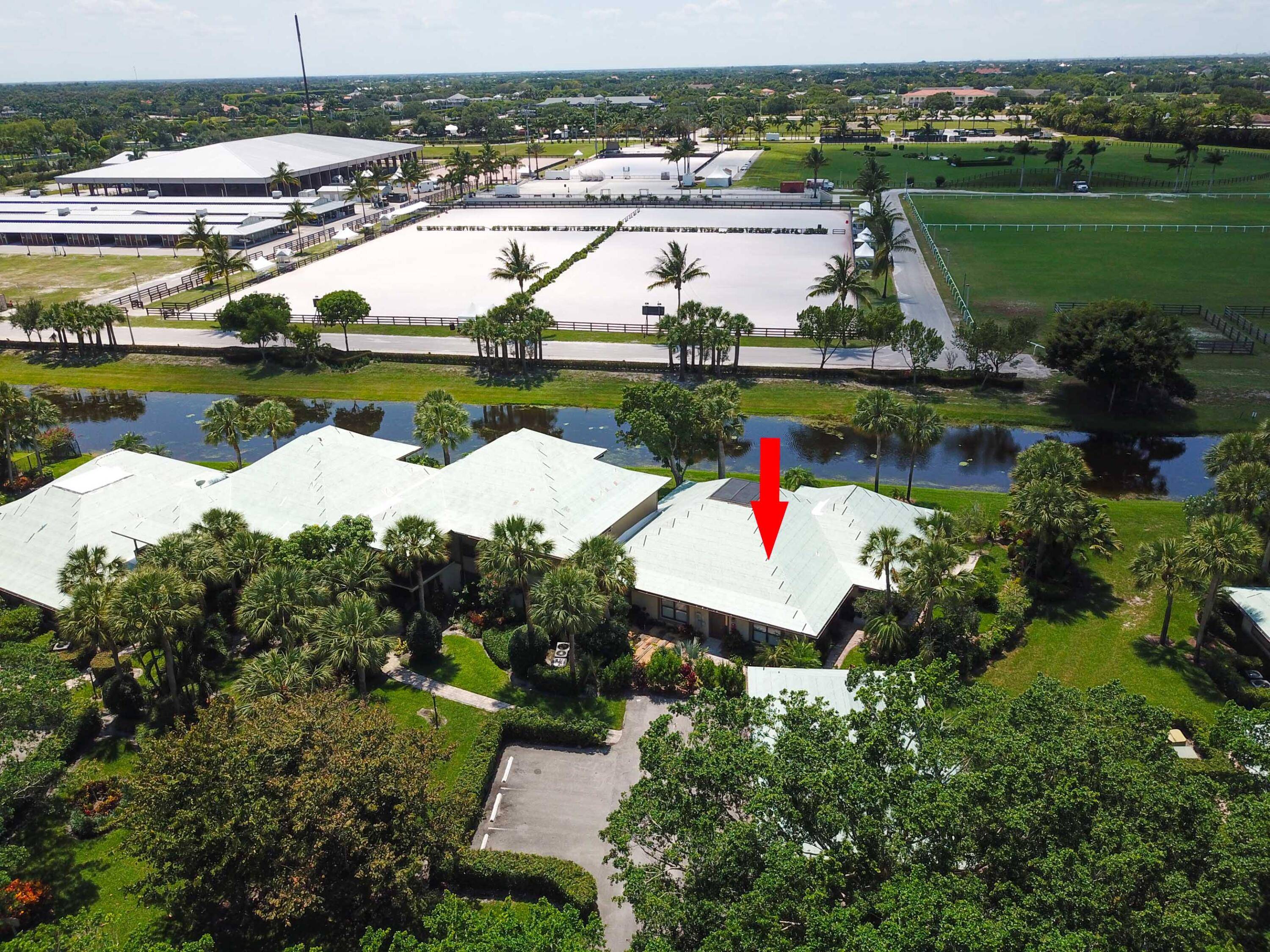 Turn key villa on banyan lined Polo Island Drive.