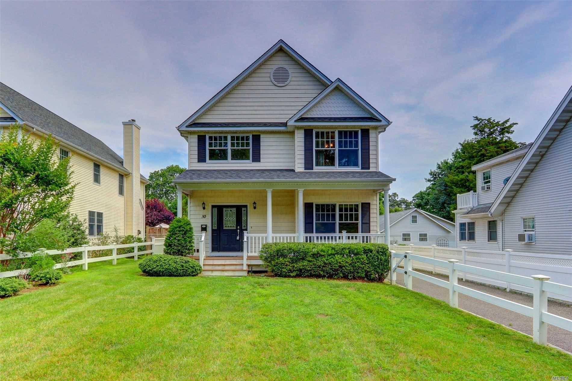 Young Colonial Victorian Flair, 2008 Built, Front Porch, off street parking and Garage, fenced, Village location Wood burning Fireplace, Laundry on main, guest bath, Master suite with soaking tub and ...