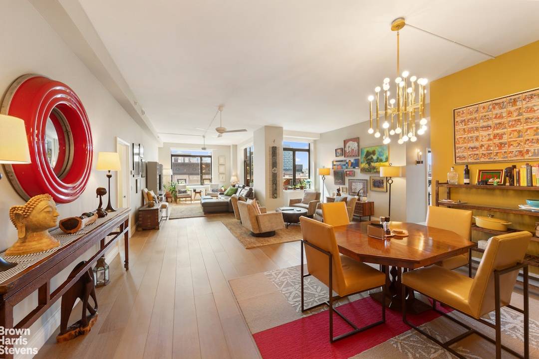 Imagine yourself unwinding on a stunning, professionally landscaped wraparound terrace with open views of Harlem's iconic skyline.