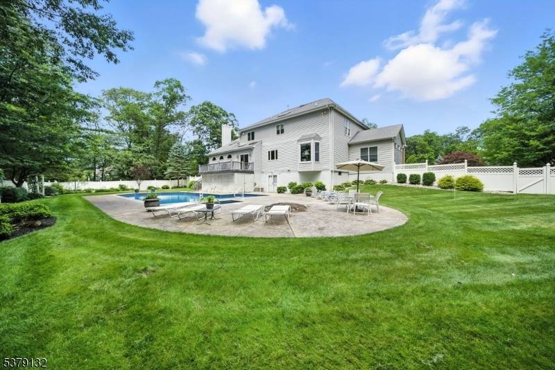 Nestled in one of Morris County's most desirable towns, this stunning Colonial offers an upscale lifestyle on a quiet cul de sac amid an enclave of luxury homes.