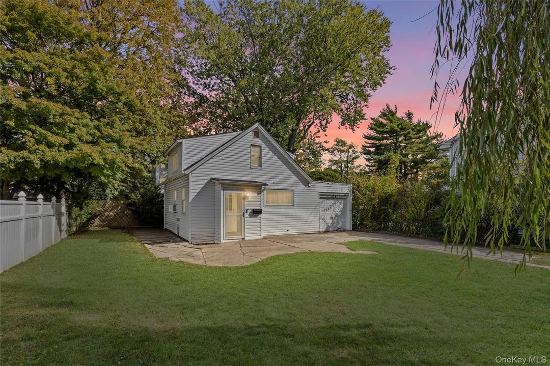 Welcome home to this charming cape style house located in the heart of Lindenhurst Village.