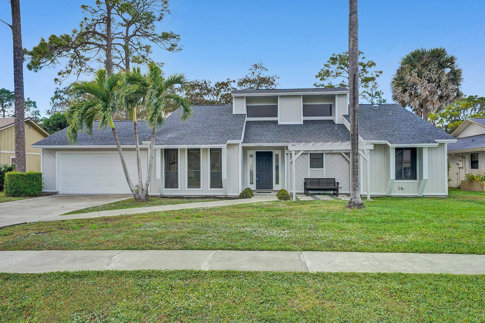 Step into luxury with this immaculate 3 bedroom, 2 bath residence, where modern elegance meets tropical tranquility.