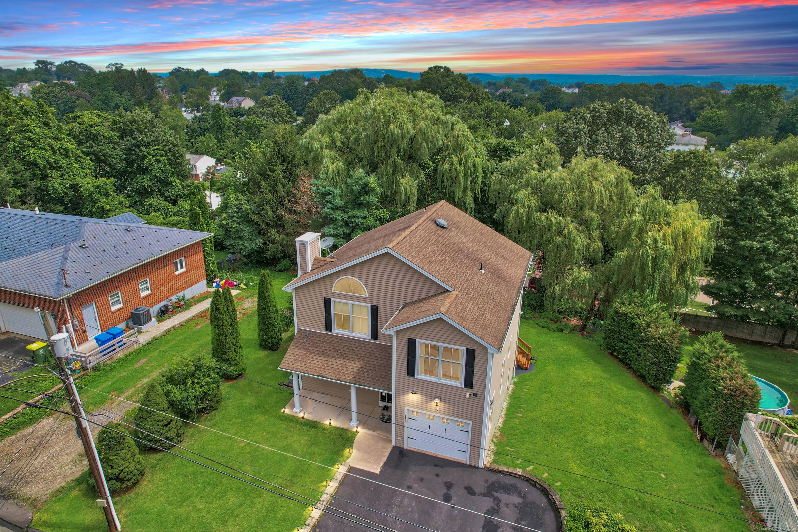 Welcome to 103 Esther Avenue, nestled in Waterbury's sought after Town Plot neighborhood.