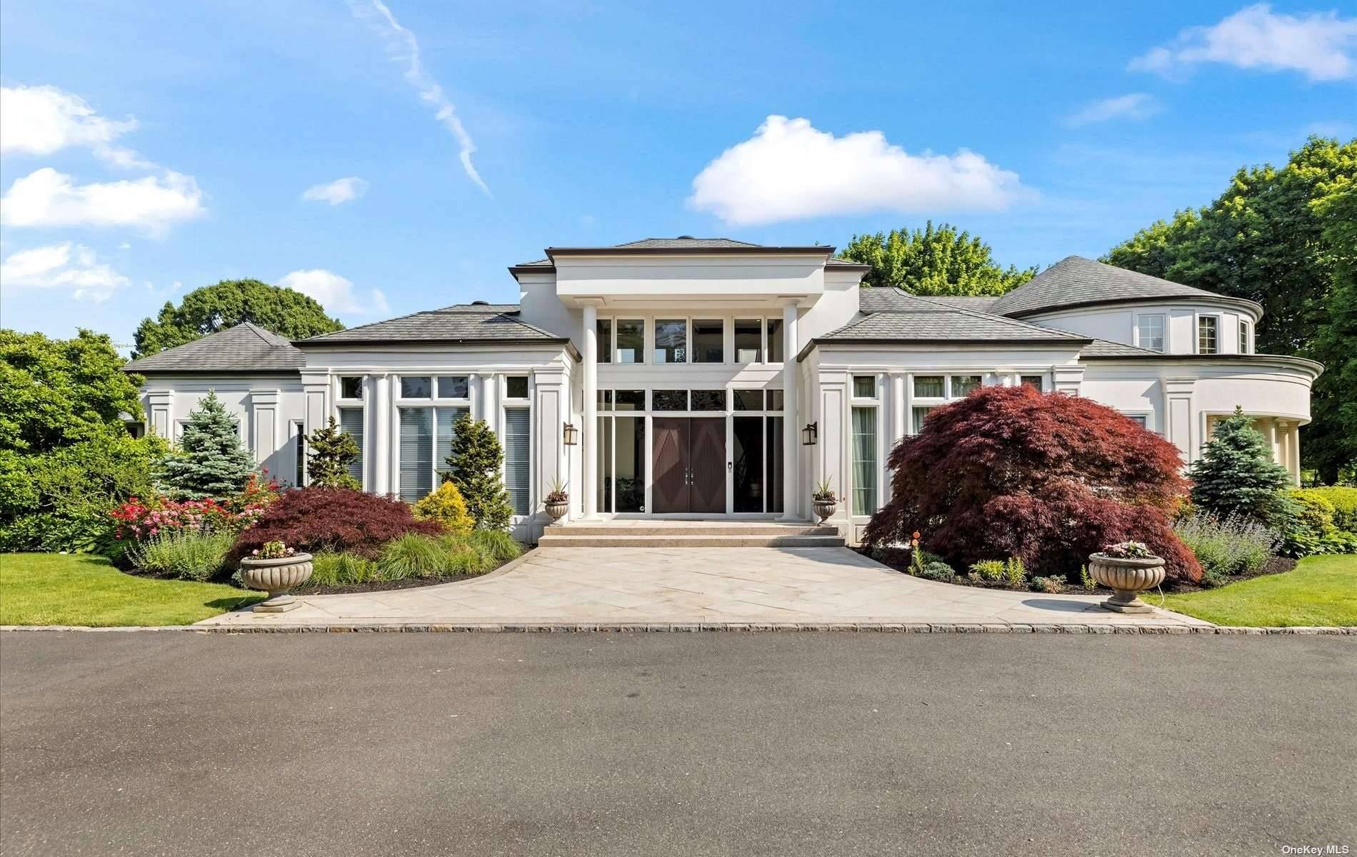 Experience the grandeur of this 12, 048 square foot including legal basement, center hall colonial, boasting 12 14 foot ceilings and walls of windows that illuminate the enormous room sizes.