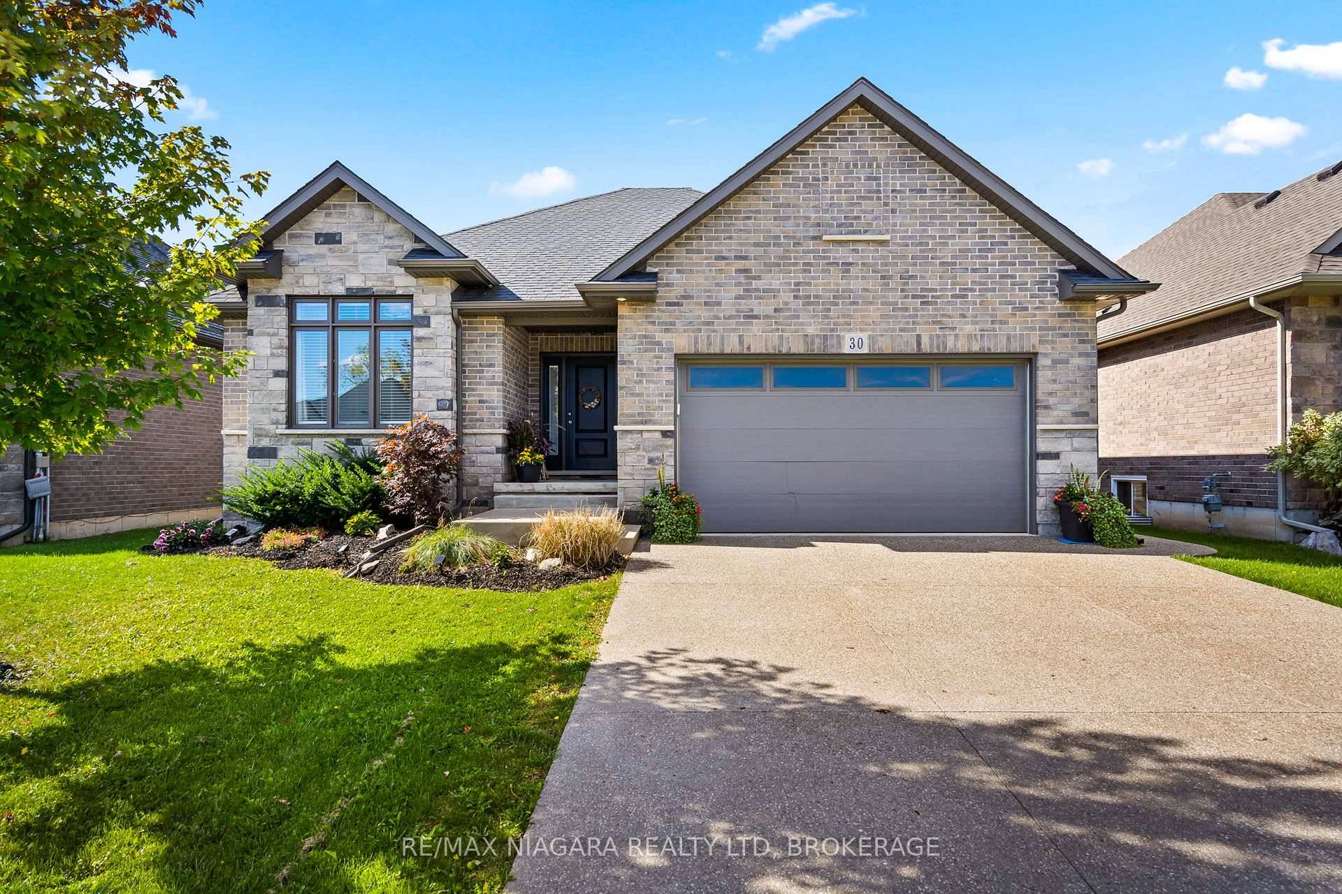 Welcome to this custom built modern luxury home in the sought after Westwood Estates, just minutes from Lake Erie.