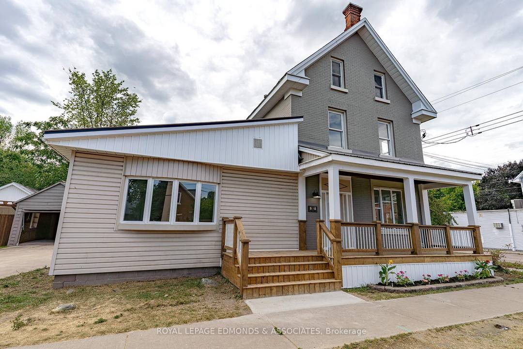 Welcome to this recently renovated, income producing property, featuring a modern 4 bedroom, 2 bathroom, home along with a secondary 1 bed, 1 bath, apartment.