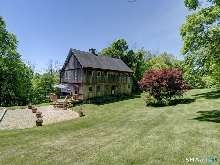 Spacious cedar sided colonial within minutes of Litchfield Green.