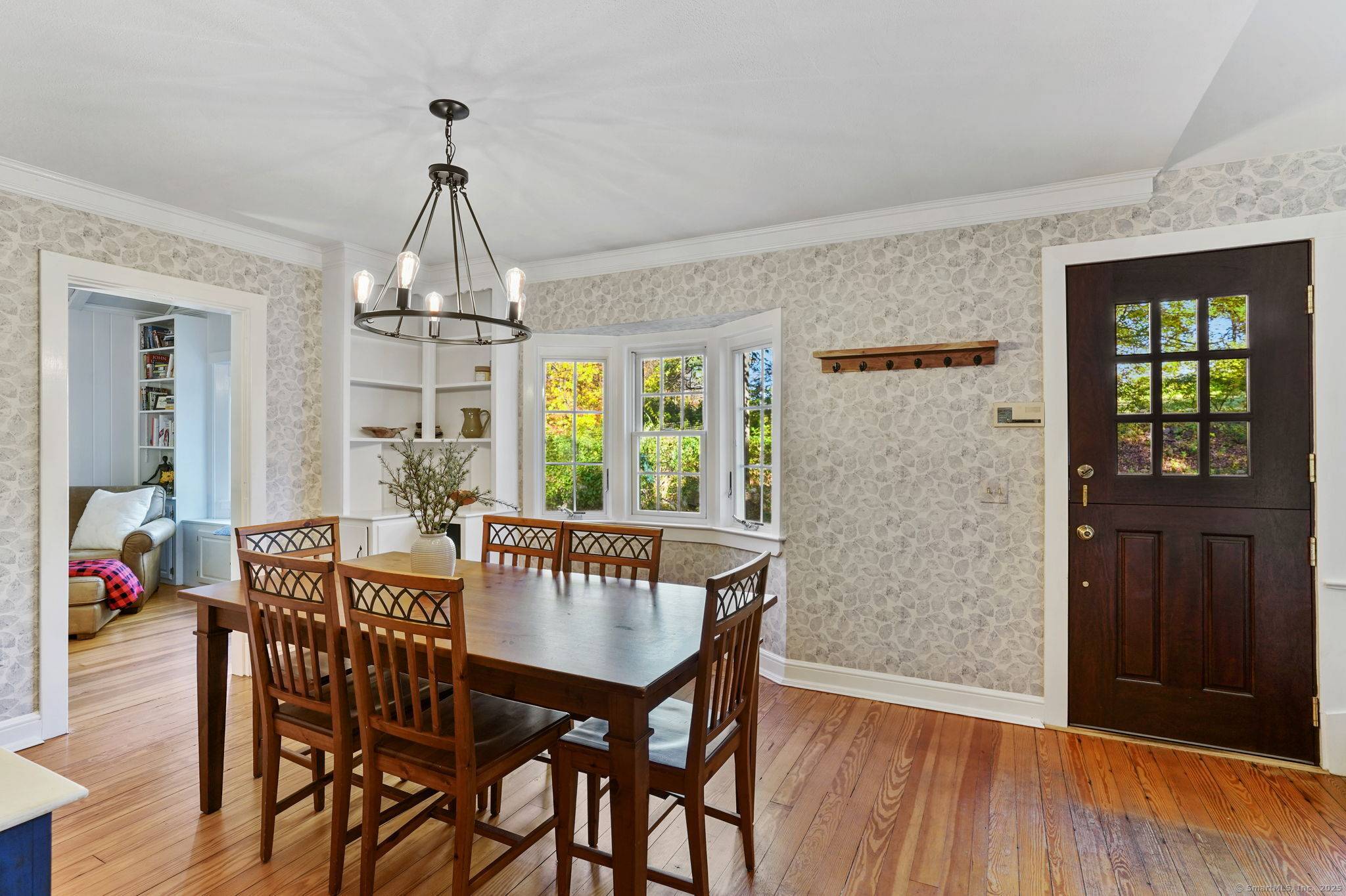 Welcome to this quintessential Connecticut Cape an enchanting retreat on 2 acres, a true gardener's paradise nature lover's dream.