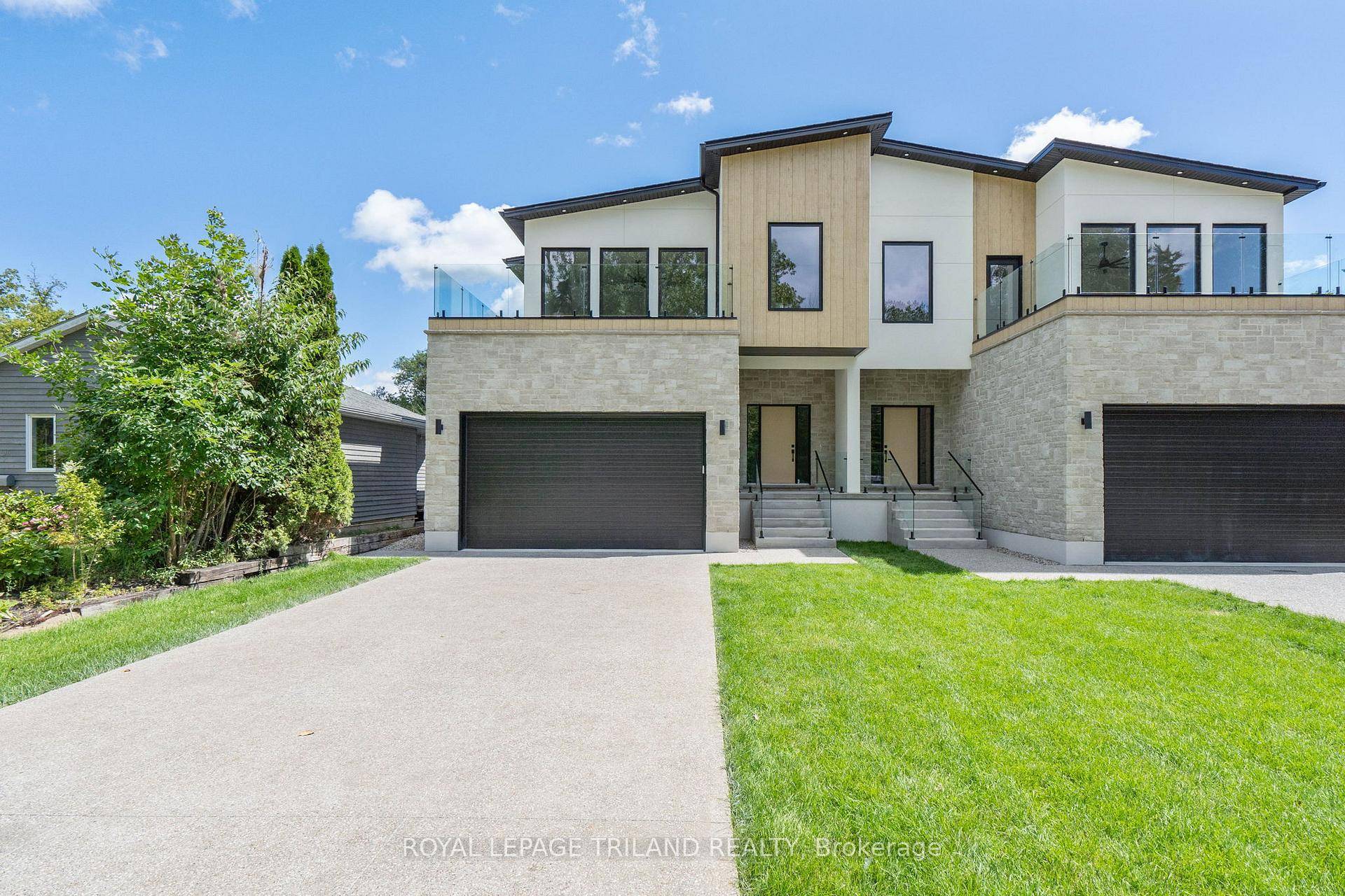 Welcome to 32 Alberta Street, a stunning custom built home by Cloverwood Homes, just steps from the shores of Grand Bend.