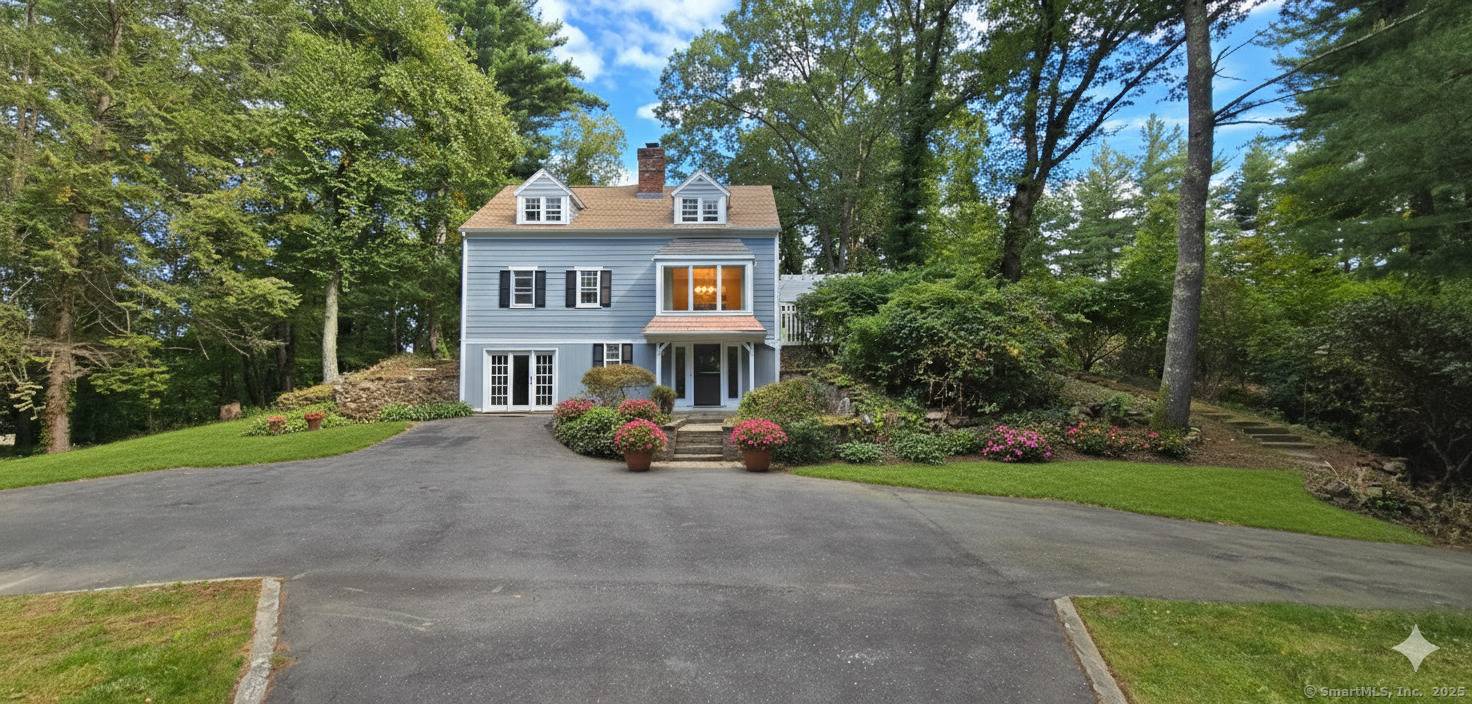 Welcome to 187 W Avon Road, Avon CT, a rare opportunity to own an original Cape Cod style home privately set on 4.