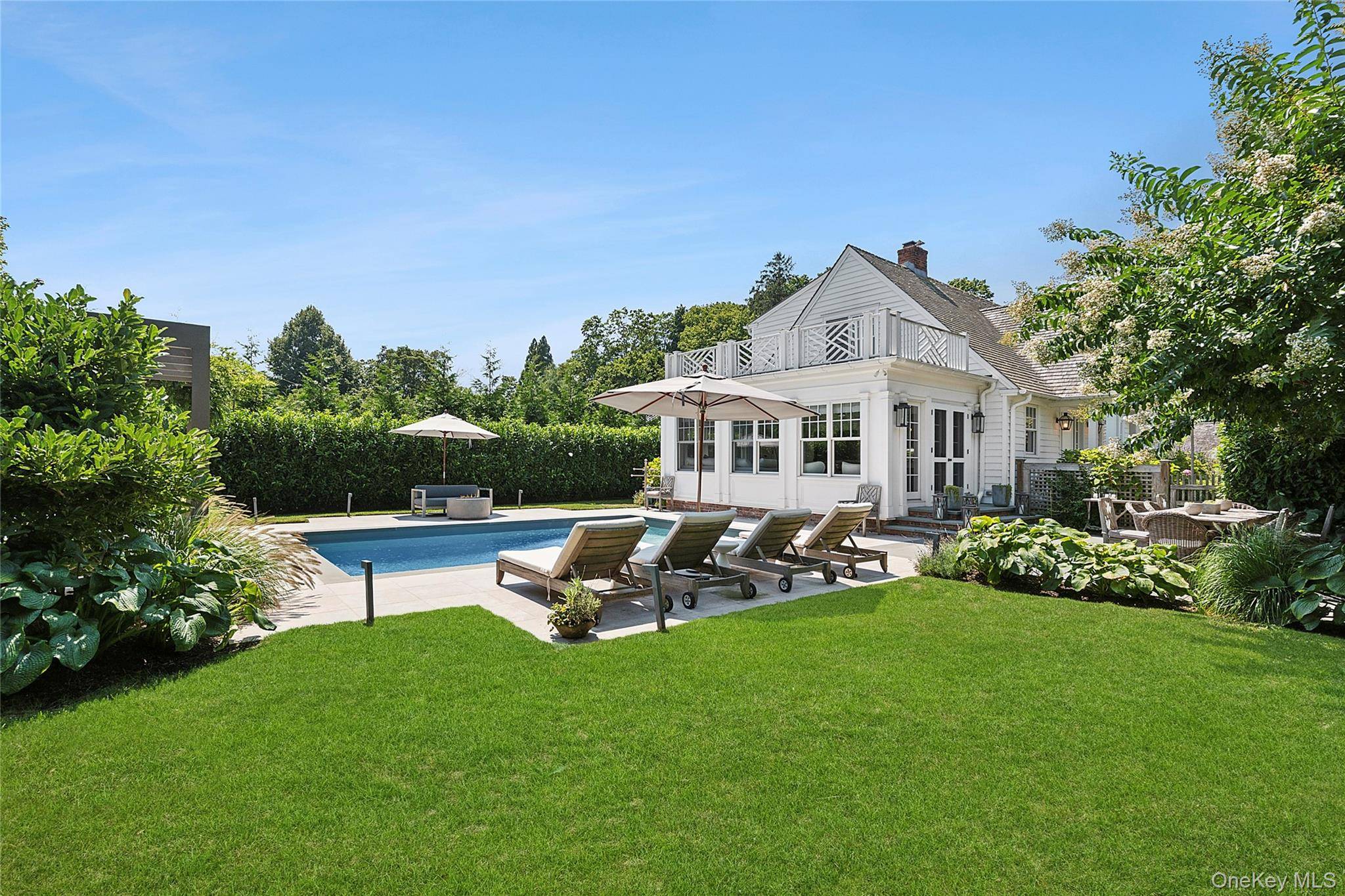 Tucked away on a quiet private cul de sac in the heart of Southampton Village, 63 Halsey Street is a masterclass in refined Hamptons living.