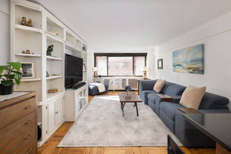 New to the market, this investor friendly, spacious one bedroom enjoys a combination of natural light and serenity with partial views of the East River.