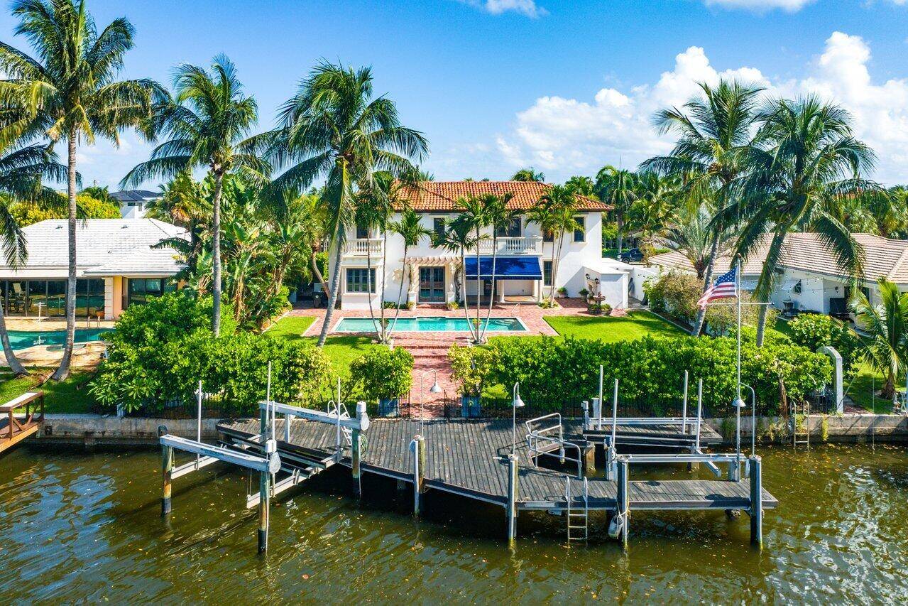 Experience unparalleled elegance exclusivity in the prestigious College Park neighborhood of Lake Worth Beach.