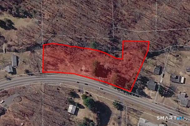 Vacant lot that was previously approved for 8, 000 square foot Retail Strip Center.