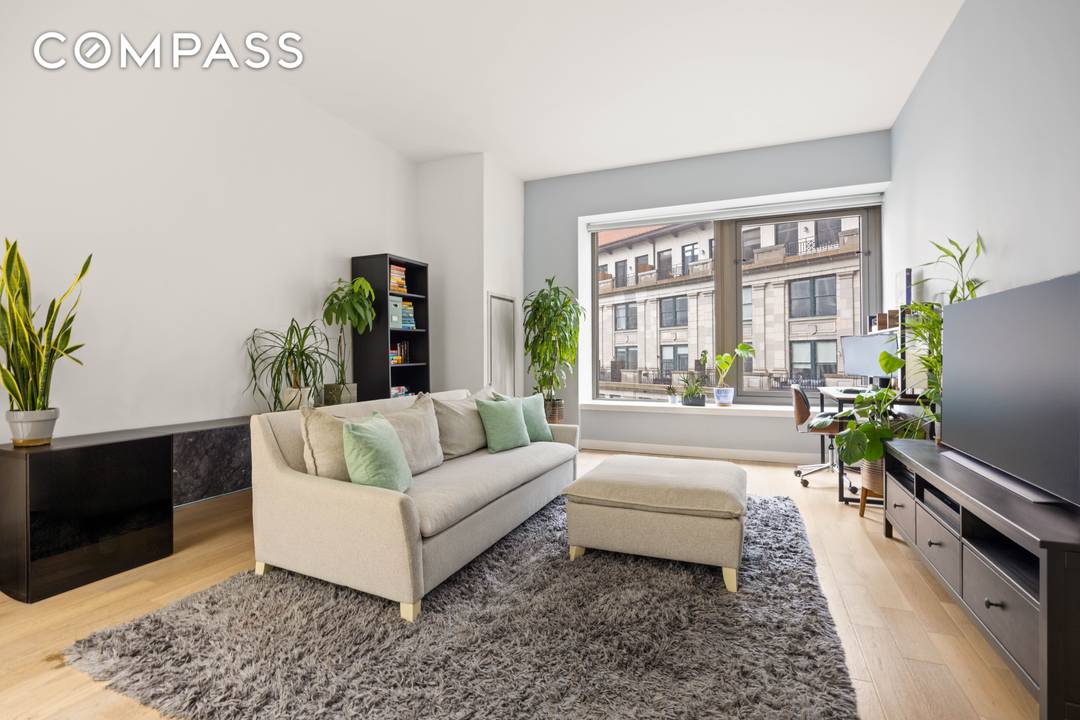 Sophisticated Loft Style 1 Bedroom with Soaring Ceilings at 75 Wall Street Welcome home to this expansive 826 SF one bedroom, one and a half bath residence, where loft like ...