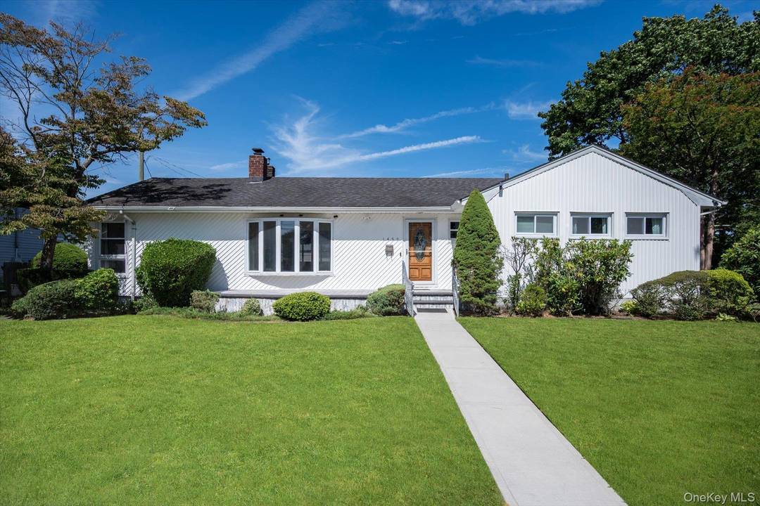 Expanded Ranch In The Heart Of East Meadow !