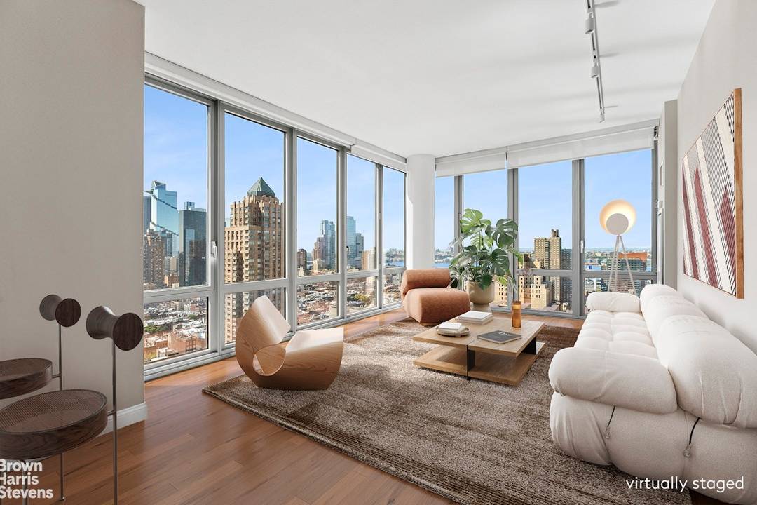 Perched high above Midtown, Residence 28B at The Link Condominium is a sun filled, corner two bedroom, two and a half bath spanning over 1, 300 SF.