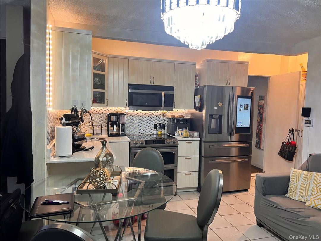 5 Units in property, 4 Residential apartments and 1 commercial.