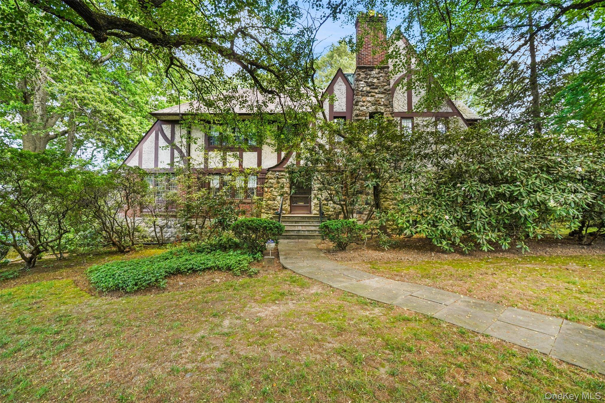 Experience the timeless grandeur of this stately Tudor home, nestled in one of New Rochelle's most coveted neighborhoods.