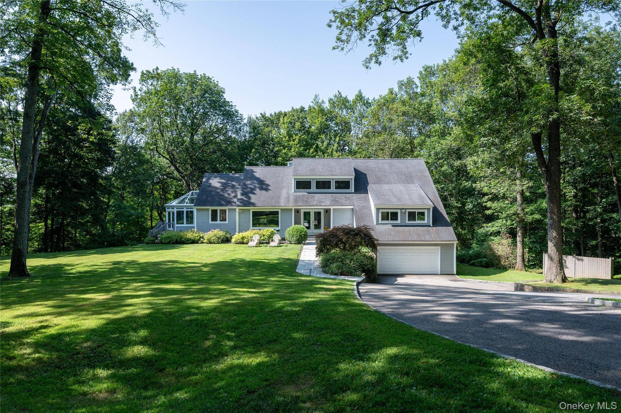 Welcome to this stunning 4 bedroom modern home, perfectly nestled on a quiet no through street in the sought after Whippoorwill neighborhood of Armonk.