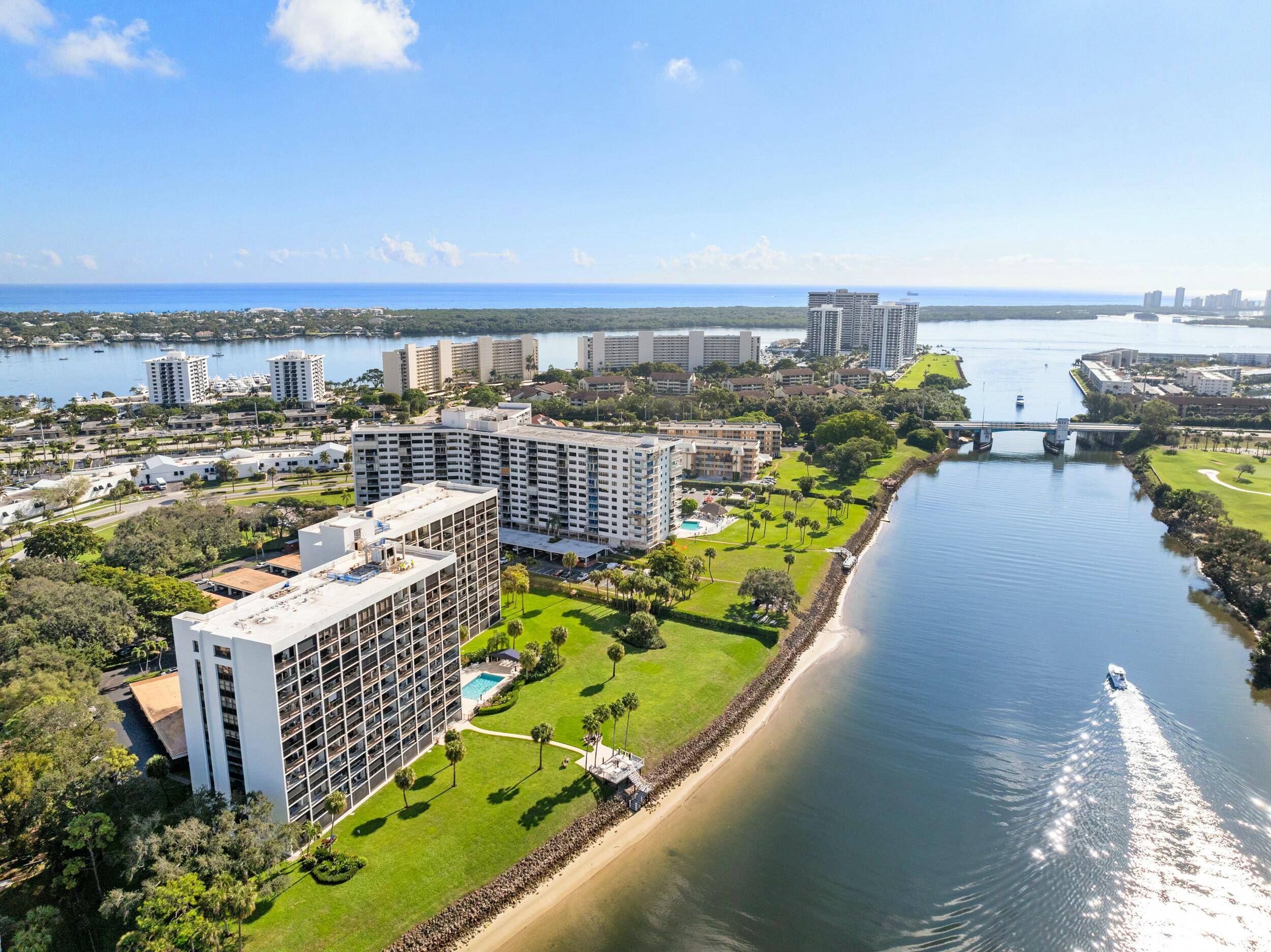 Step into luxury with this beautifully updated waterfront condo offering panoramic views of the Intracoastal Waterway North Palm Beach Golf Course.