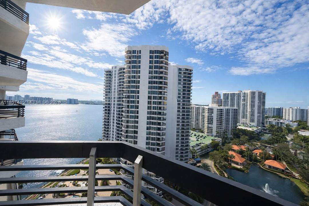 Magnificent 2BR 2BA split floor plan in Mystic Pointe Tower 100 with stunning Intracoastal, bay, pond amp ; garden views.