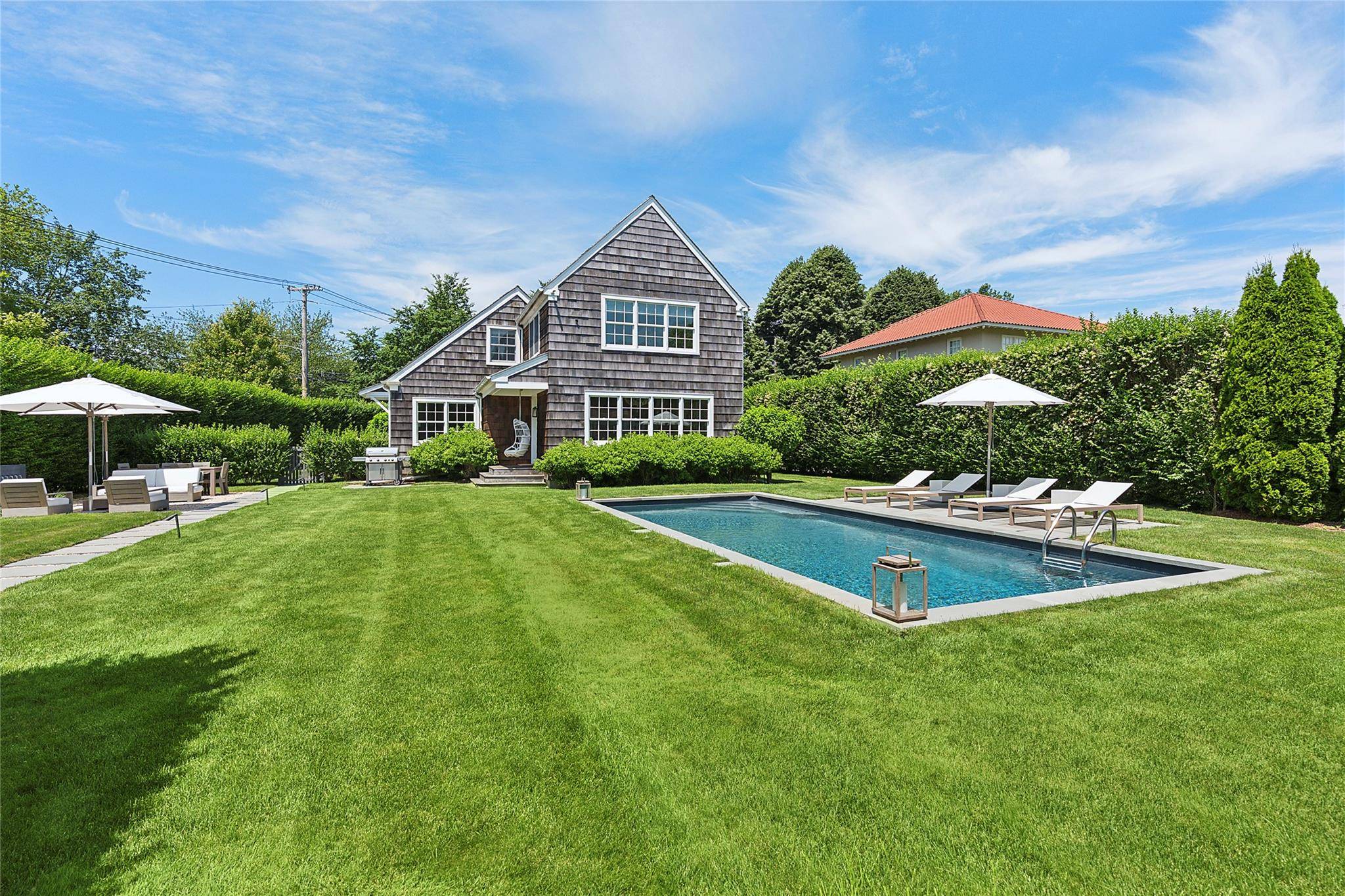 Welcome to Cedar Hedge House, where timeless Southampton charm seamlessly blends with the finest modern luxury.