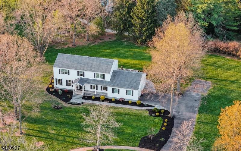 This stunning turnkey colonial with a charming front porch and bluestone walkway is nestled at the end of a cul de sac in a coveted location with proximity to parks ...