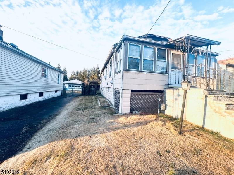 3 Bedrooms, 1 full and 1 half bathroom.