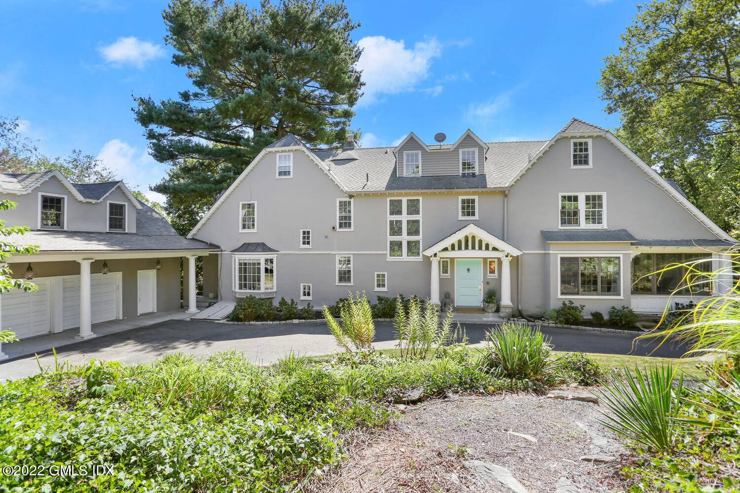 Renovated classic home close to Town, schools, commutation located on the coveted Belle Haven peninsula.