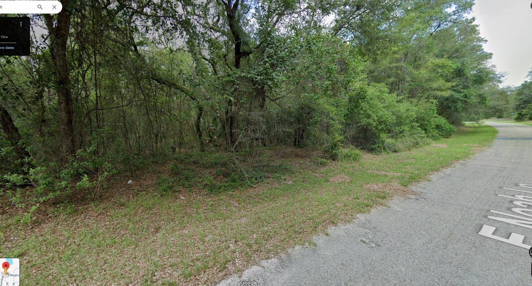 This parcel enjoys convenient access to a golf course and country club.