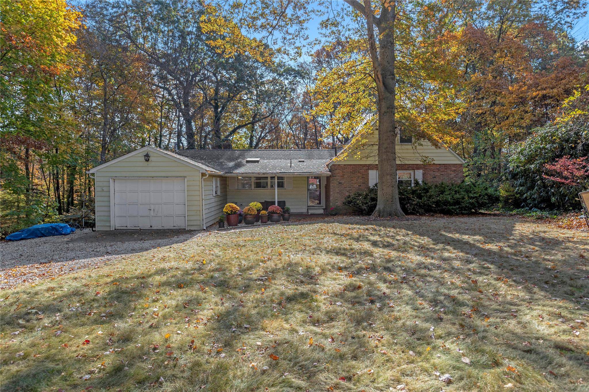 Unlock the Potential of this Oasis of Privacy in Huntington s Highly Sought After Cul De Sac !