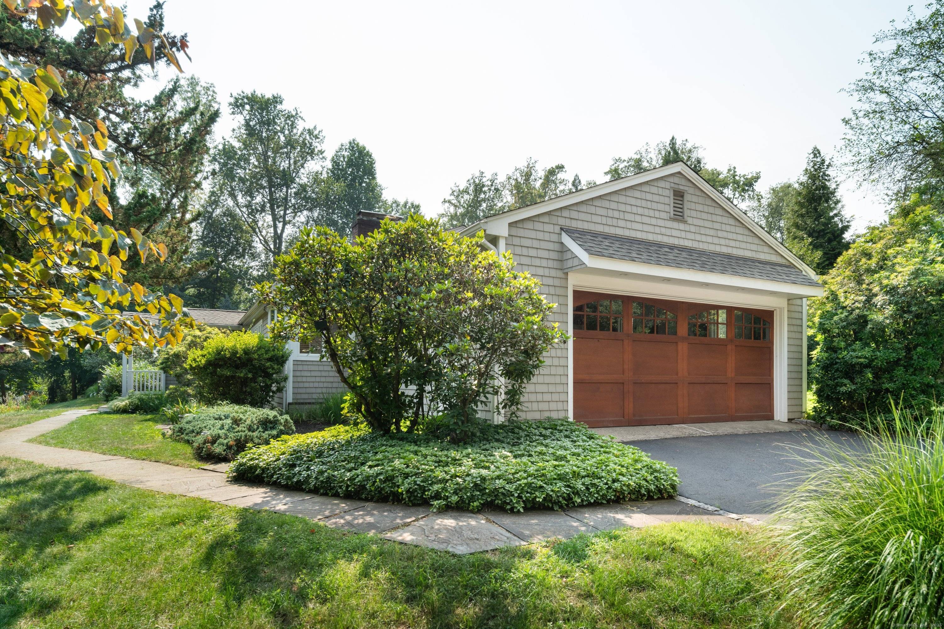 This beautifully maintained home sits on a sought after cul de sac within walking distance to Long Lots, Bedford, and Staples.