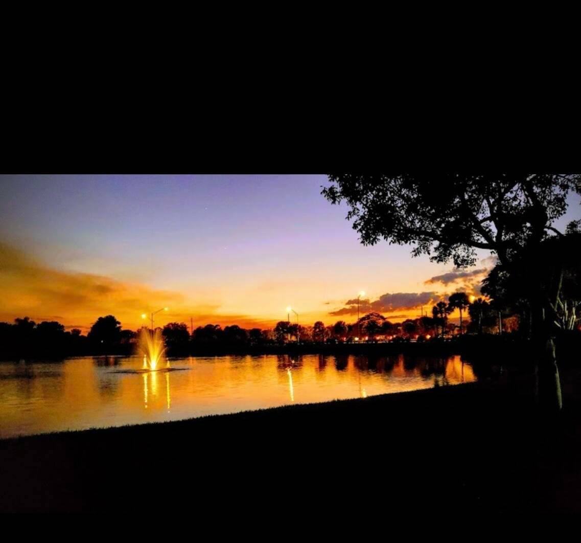 One of the largest models in Boca Gardens 2, 088 sq ft with soaring 10' ceilings and a peaceful lake view.