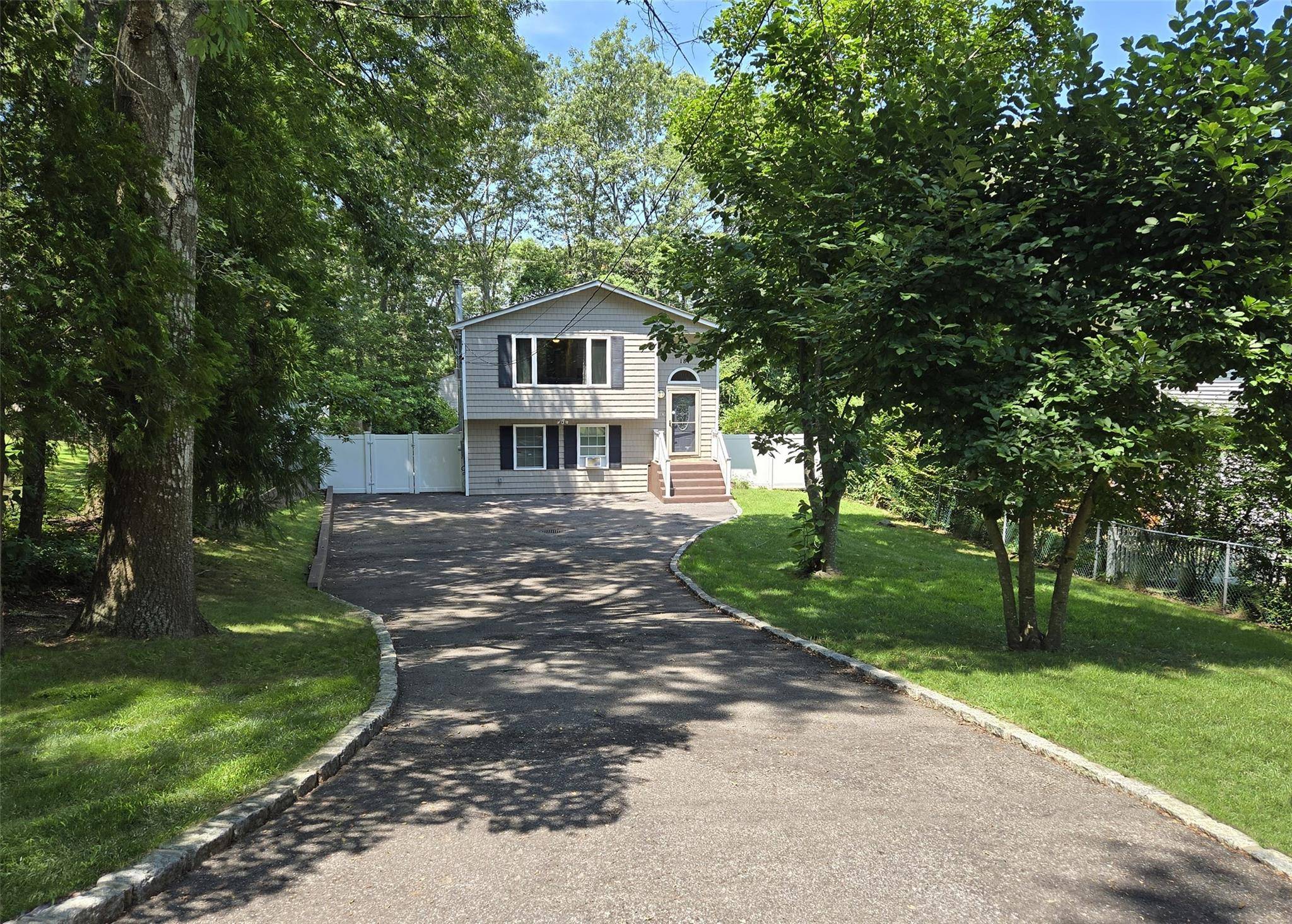 Magnificent Updated Hi Ranch, this Cobblestoned lined driveway has room for plenty of vehicles, home features Hardwood floors, 5 Bedrooms, 2 Full Updated Bathrooms, Living room open to Kitchen with ...